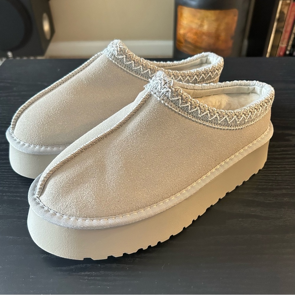 NWT short grey platform booties. Never been worn.